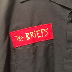 The Briefs button down punk shirt
